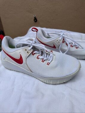 Nike White Sneakers with Red Swoosh Accents